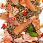 Close Up Poached Salmon, Grapefruit, Grains, and Chile