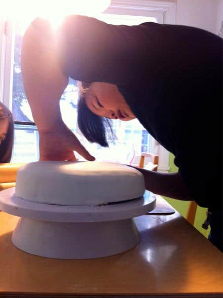 Putting the fondant on the cake