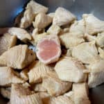 Raw chicken meat that has velveted and is ready for Stir-Fry